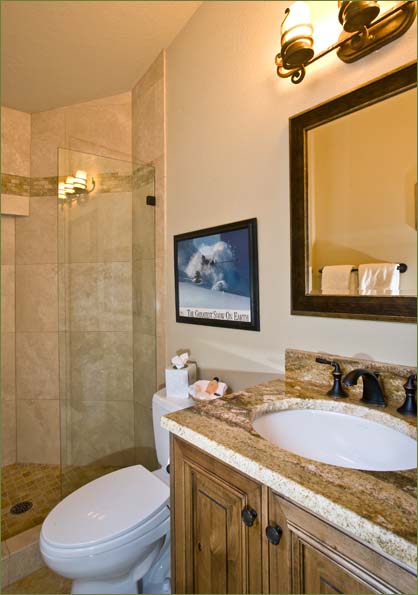 Each of four bedrooms features a private bathroom.